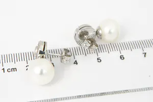 Paar 14Krt witgoud & diamanten oorstekkers  met  Parels kopen? Bied vanaf 160!