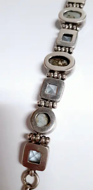 Zilveren Armband bezet met ovale facetgeslepen Aquamarijn en ovale turkoois kopen? Bied vanaf 85!