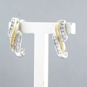 14k bicolour gouden oorknoppen bezet met briljant geslepen diamant tot. 0,20ct kopen? Bied vanaf 410!