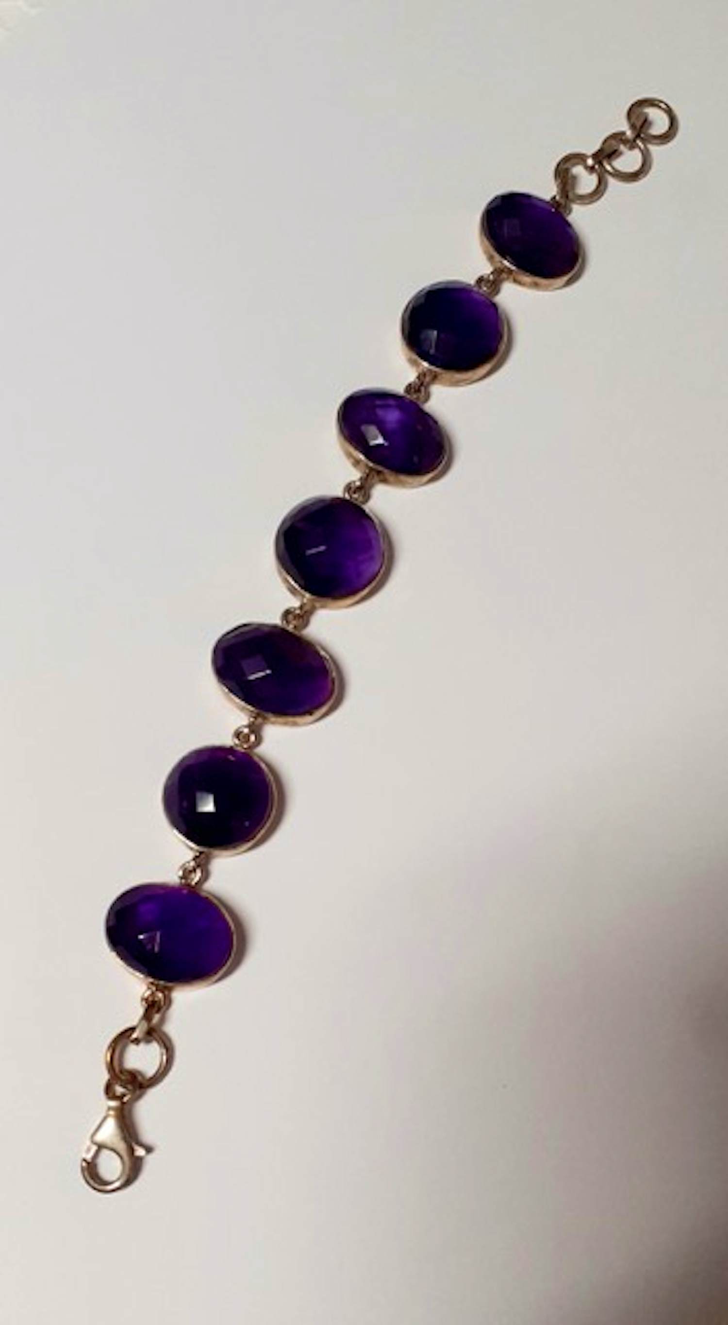 Nieuw zilveren armband bezet met natuurlijke ovale facetgeslepen amethyst verkocht voor € 100!