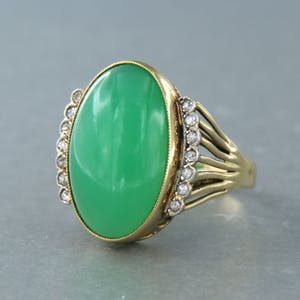 14k gouden ring bezet met chrysopaas en bolsjewiek geslepen diamant 0.20ct kopen? Bied vanaf 400!