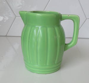 Niet of onleesbaar gesigneerd - Art deco licht groene aardewerken kan van Orchies model N3 kopen? Bied vanaf 1!