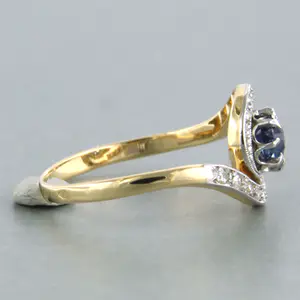 18k bicolor gouden ring met saffier en diamant 0.16 ct - 17.75 (56) kopen? Bied vanaf 300!