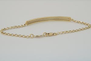2510-  18 karaats geel-gouden armband - kinder/dames model - 5 rijen zirkonia kopen? Bied vanaf 110!