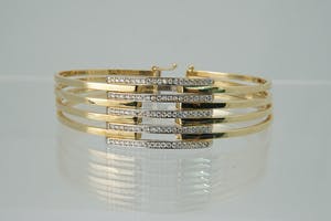 1232 - Elegante 14 karaats gouden Bicolor unisex armband - open model - gekeurd kopen? Bied vanaf 330!