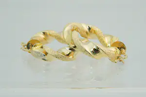 80- paar 18 Krt geel gouden holle & "gedraaide" oorringen kopen? Bied vanaf 200!