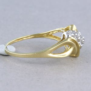 14k bicolor gouden ring bezet met briljant geslepen diamanten tot. 0,13ct kopen? Bied vanaf 1!