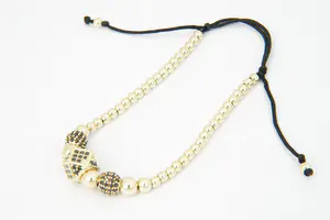 24 - Fijn Oosters gedeeltelijk gouden 14krt dames Armband met zwarte steentjes. kopen? Bied vanaf 190!