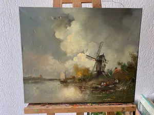 Niet of onleesbaar gesigneerd - Een typisch Hollands polderlandschap met een houten molen kopen? Bied vanaf 1!