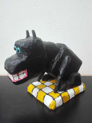 Peter Bastiaanssen - Zittend hondje op geblokt kleedje, zonder titel verkocht voor € 75!