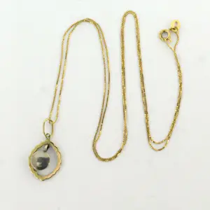 14k gouden collier met hanger bezet met diamant 0.10 ct - 60 cm kopen? Bied vanaf 340!