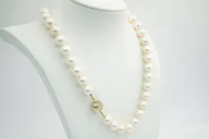 120 - Fraai vintage (cultive) parel halssieraad met 14Kt gouden pastonslot kopen? Bied vanaf 220!