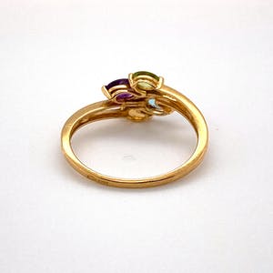 handgemaakte 18kt gouden ring met kleur edelstenen maat 54(17,5) 2,10 gr kopen? Bied vanaf 120!