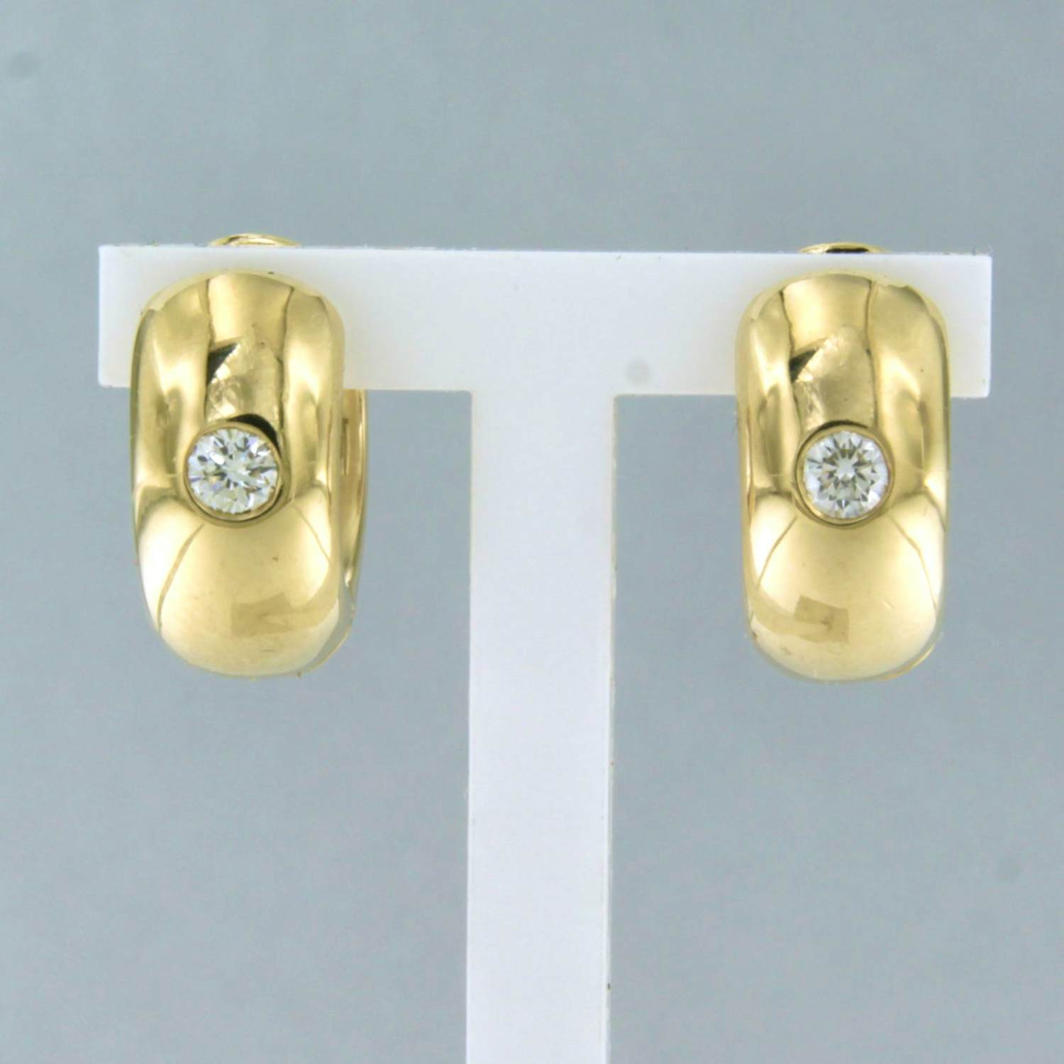14k geelgouden creolen met briljant geslepen diamant 0.16 ct kopen? Bied vanaf 600!