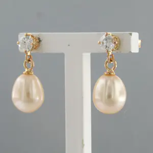 18k rosé gouden oorhangers met parel en briljant geslepen diamant tot. 0.40ct kopen? Bied vanaf 500!