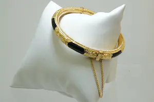 6 - grote Surinaamse 14Krt geel gouden armband met zwarte kunststof kern kopen? Bied vanaf 450!