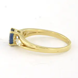 Acheter18k gouden ring met saffier tot. 0.88ct en marquise geslepen diamant tot.0.20ct? Enchérissez de 685!