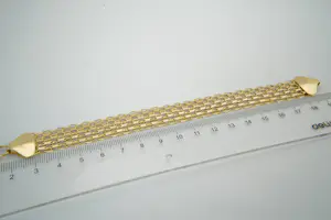 58- Brede, in 6 rijen gevlochten 14 karaats geel-gouden schakel armband kopen? Bied vanaf 560!