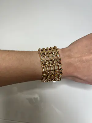 Opvallende 18 karaat geelgouden brede armband kopen? Bied vanaf 6000!
