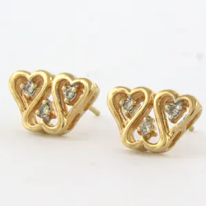 14k geelgouden oorknoppen bezet met briljant geslepen diamant 0.06ct kopen? Bied vanaf 145!