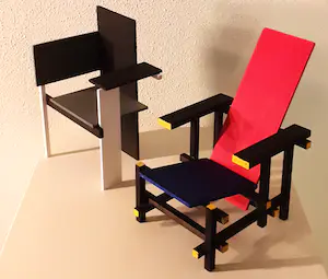 AcheterGerrit Rietveld - Twee miniatuur designstoeltjes Berlin chair en Rood-Blauwe stoel? Enchérissez de 99!