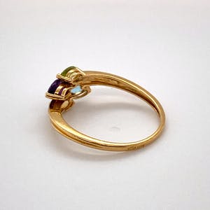 handgemaakte 18kt gouden ring met kleur edelstenen maat 54(17,5) 2,10 gr kopen? Bied vanaf 120!