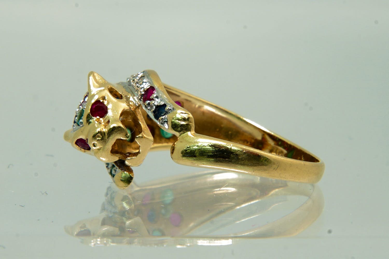 31 - Fraaie 14 Krt gouden panter-ring met 8kant geslepen diamant kopen? Bied vanaf 90!