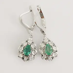 Oorbellen met smaragd en diamanten kopen? Bied vanaf 1250!