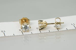 2005- Mooie set 14 krt geel-goud & diamanten (ca.0.70ct) oorstekers kopen? Bied vanaf 730!