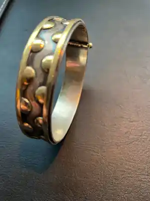 AcheterJan Noyons - Armband goud met zilver? Enchérissez de 1500!