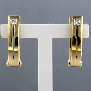 Acheter18k geel gouden oorbellen bezet met briljant geslepen diamant 0.06 ct? Enchérissez de 360!