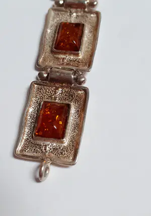 AcheterIn nieuwstaat .Zilveren armband bezet met natuurlijke rechthoekige Barnsteen? Enchérissez de 100!