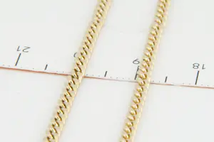 01 - Sierlijk en massief 14 Krt geel-gouden "geslepen" gourmette collier kopen? Bied vanaf 390!