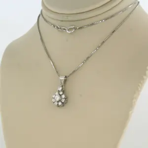 18k wit gouden collier en 14k gouden hanger met briljant geslepen diamant 0.50ct kopen? Bied vanaf 740!