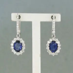 Acheter18k gouden oorhangers met saffier en briljant geslepen diamant tot. 0.72ct? Enchérissez de 1100!