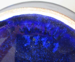 Niet of onleesbaar gesigneerd - WAKU diep blauwe aardewerken theepot met rieten hengsel kopen? Bied vanaf 1!