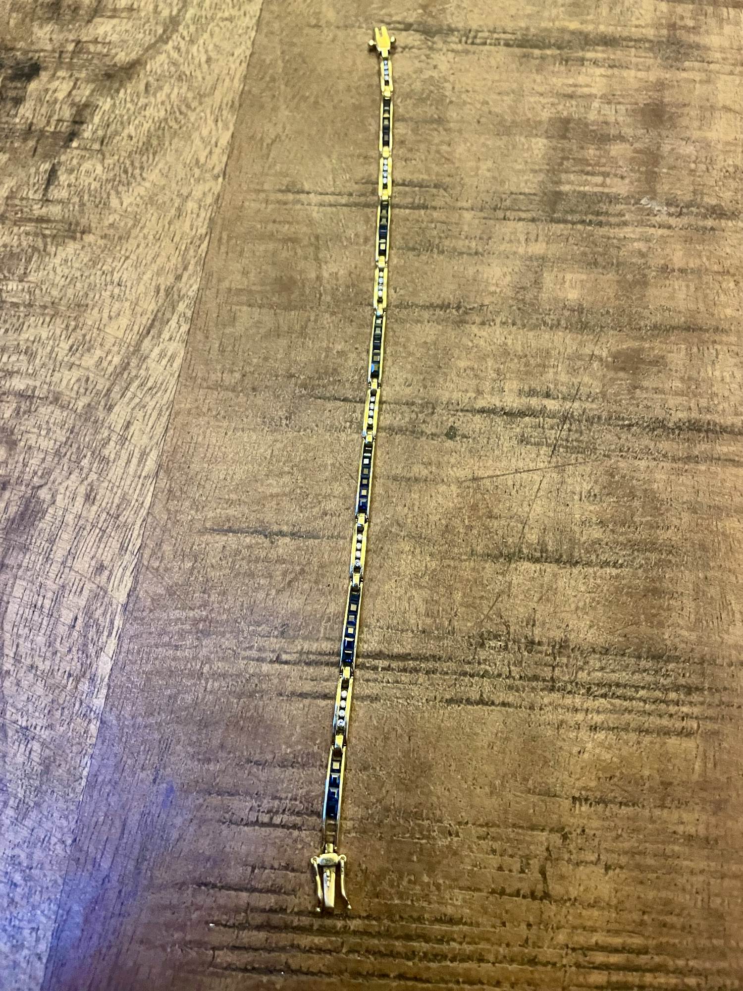 Armband met briljant en saffier kopen? Bied vanaf 300!