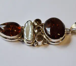 zilveren Hanger met facet geslepen citrien en Amber en oester streepparel kopen? Bied vanaf 70!