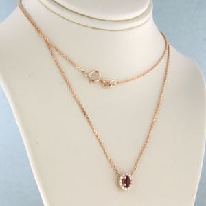 14k gouden collier/hanger met robijn en briljant geslepen diamant tot. 0.10ct kopen? Bied vanaf 200!