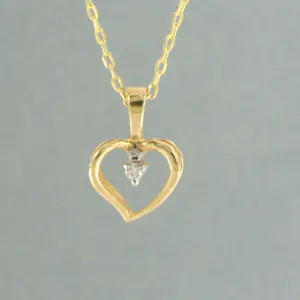 14k gouden collier met hanger bezet met briljant geslepen diamant kopen? Bied vanaf 110!