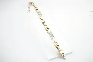 109- Zware 18Krt bicolor gouden & diamanten (0.50ct) fantasie armband kopen? Bied vanaf 1670!