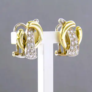 14k bicolour gouden oorclips met briljant geslepen diamant 0.60ct - 6.4 grams kopen? Bied vanaf 950!