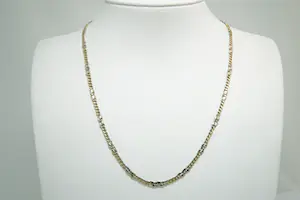 Acheter47- Zo goed als nieuw relatief lang 14 karaat gouden bicolor gourmette collier? Enchérissez de 560!