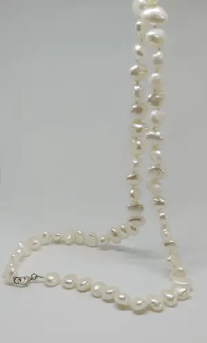 Barok Zoetwaterparel Collier Ivoorwit met dubbel zilver slotje 64cm lang kopen? Bied vanaf 65!