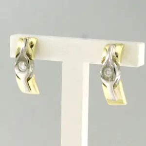 14k bicolour gouden oorknoppen bezet met briljant geslepen diamant tot. 0,06ct kopen? Bied vanaf 250!