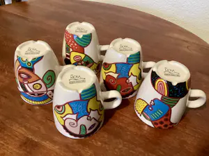 N.V. Porselein- en Tegelfabriek Mosa - Clemens Briels 5 x kleine mokken en 2 x grote mokken v Nikolai Carels kopen? Bied vanaf 20!