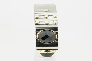 Opvallende staal en 18 krt gouden NOMINATION armband - met 4 grote stenen kopen? Bied vanaf 120!