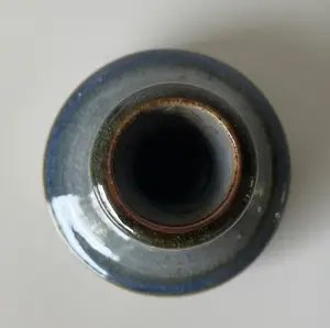 Ardine Spitters - Twee steengoed kandelaren kopen? Bied vanaf 1!