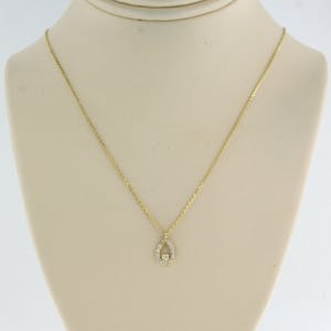 14k gouden collier met hanger bezet met briljant geslepen diamant tot. 0,07ct kopen? Bied vanaf 1!
