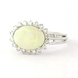 18k gouden ring met centraal opaal en briljant geslepen diamant tot. 0.36ct kopen? Bied vanaf 640!